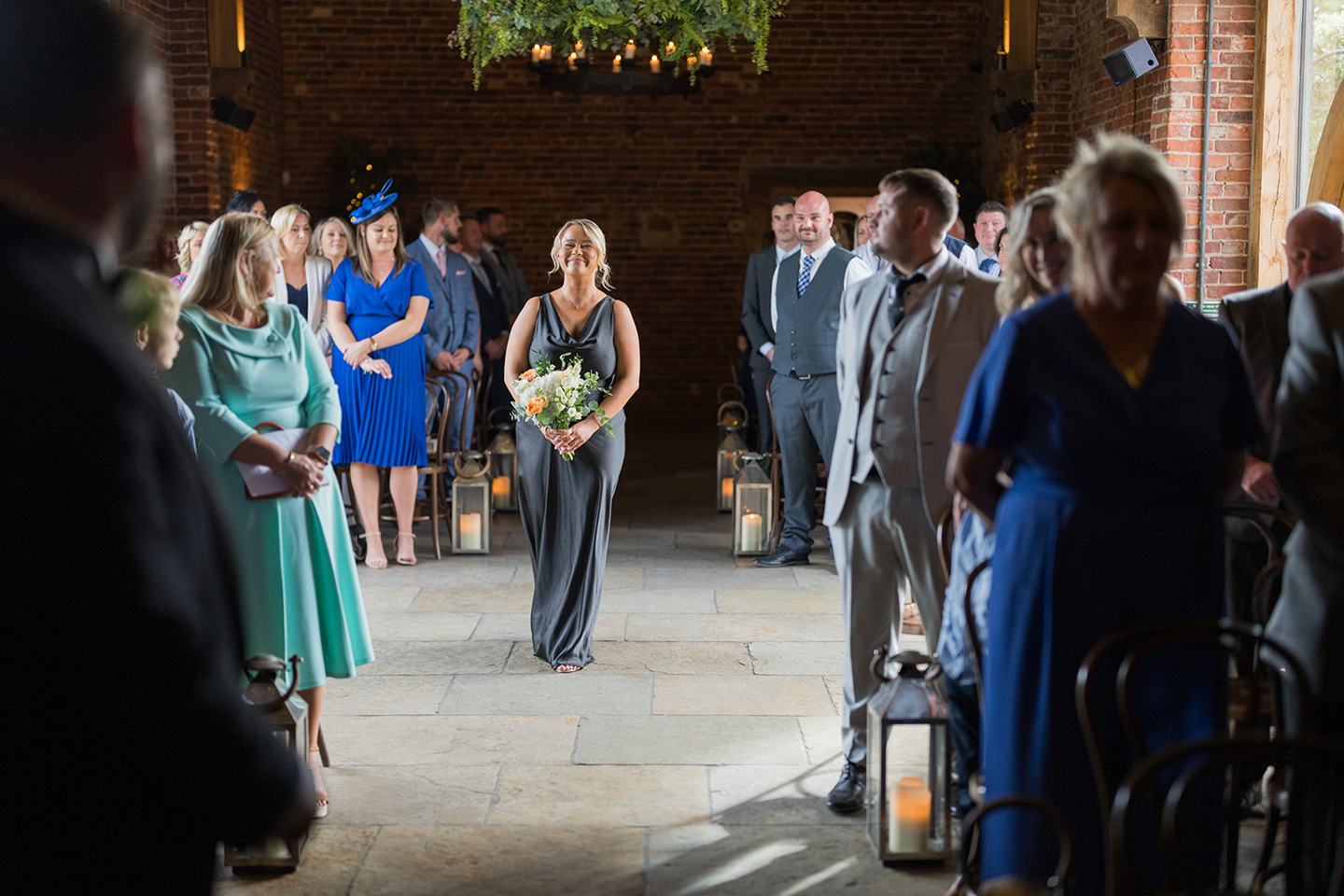 Walking down the aisle at Emma and Sam’s Hazel Gap Barn wedding