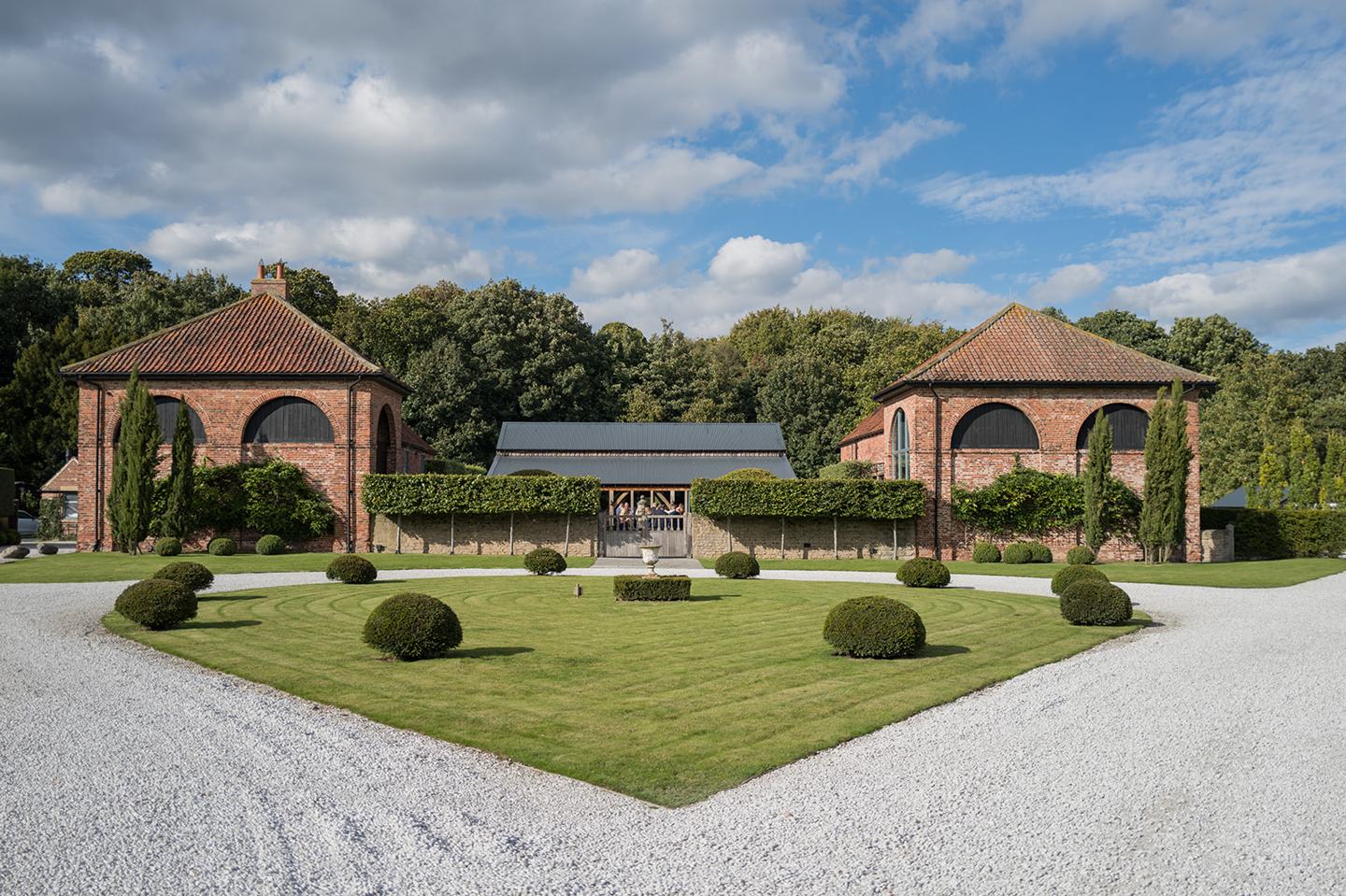 The barns and courtyard at Emma and Sam’s Hazel Gap Barn wedding