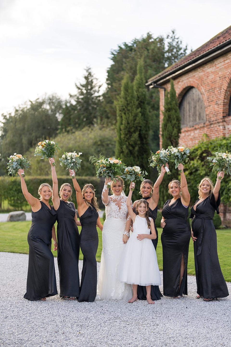Bridesmaids celebrating at Emma and Sam’s Hazel Gap Barn wedding