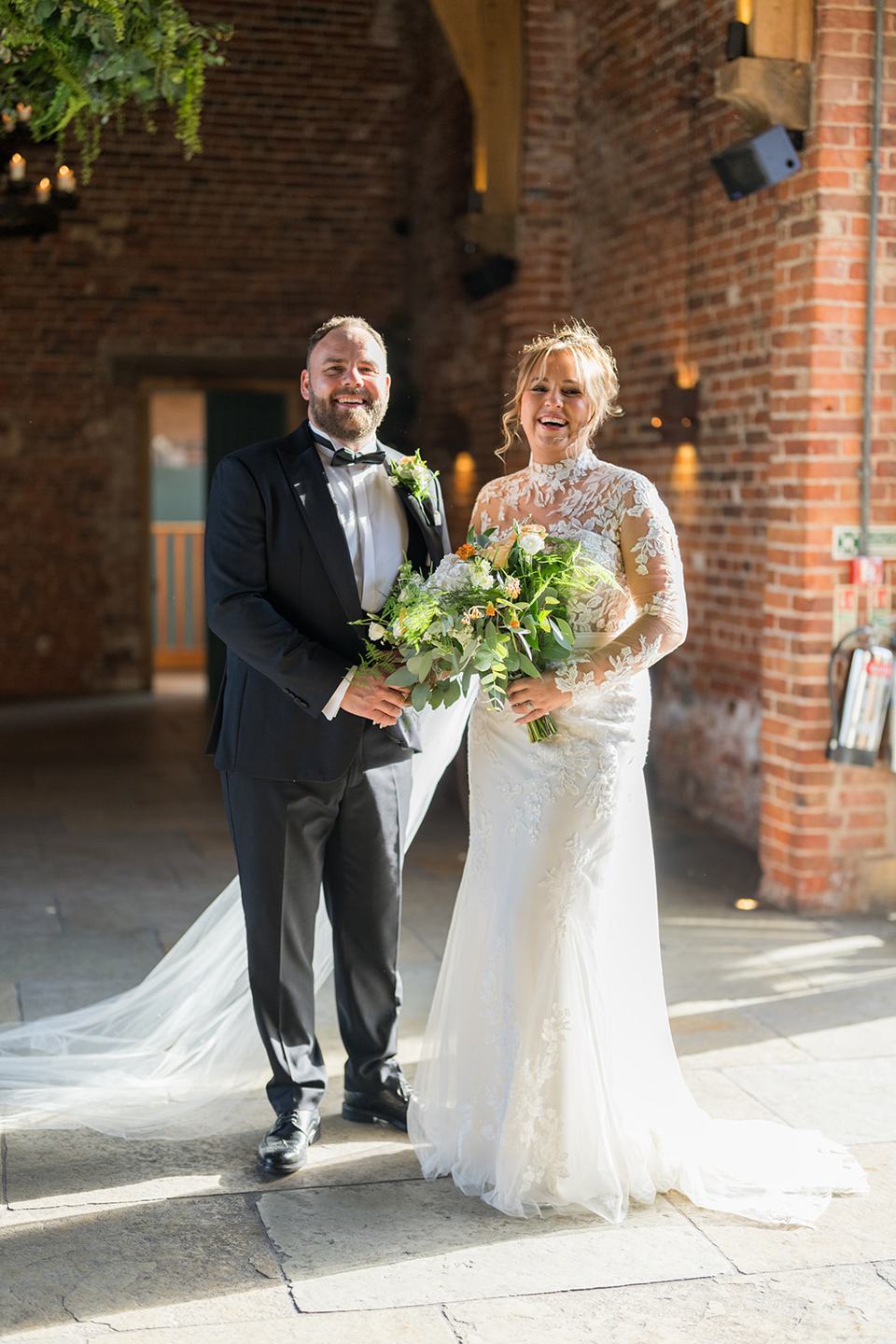 Portrait in window light at Emma and Sam’s Hazel Gap Barn wedding