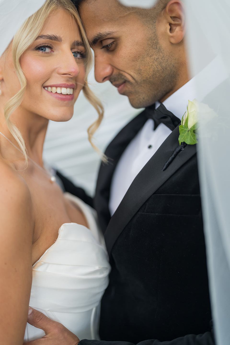 Close-up newlywed portrait at Mia and Herman’s Healey Barn wedding