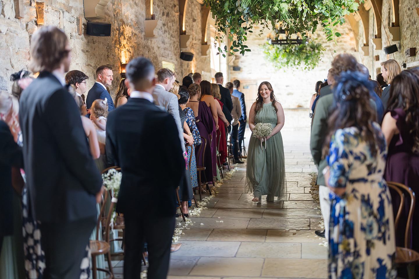 Walking down the aisle at Mia and Herman’s Healey Barn wedding