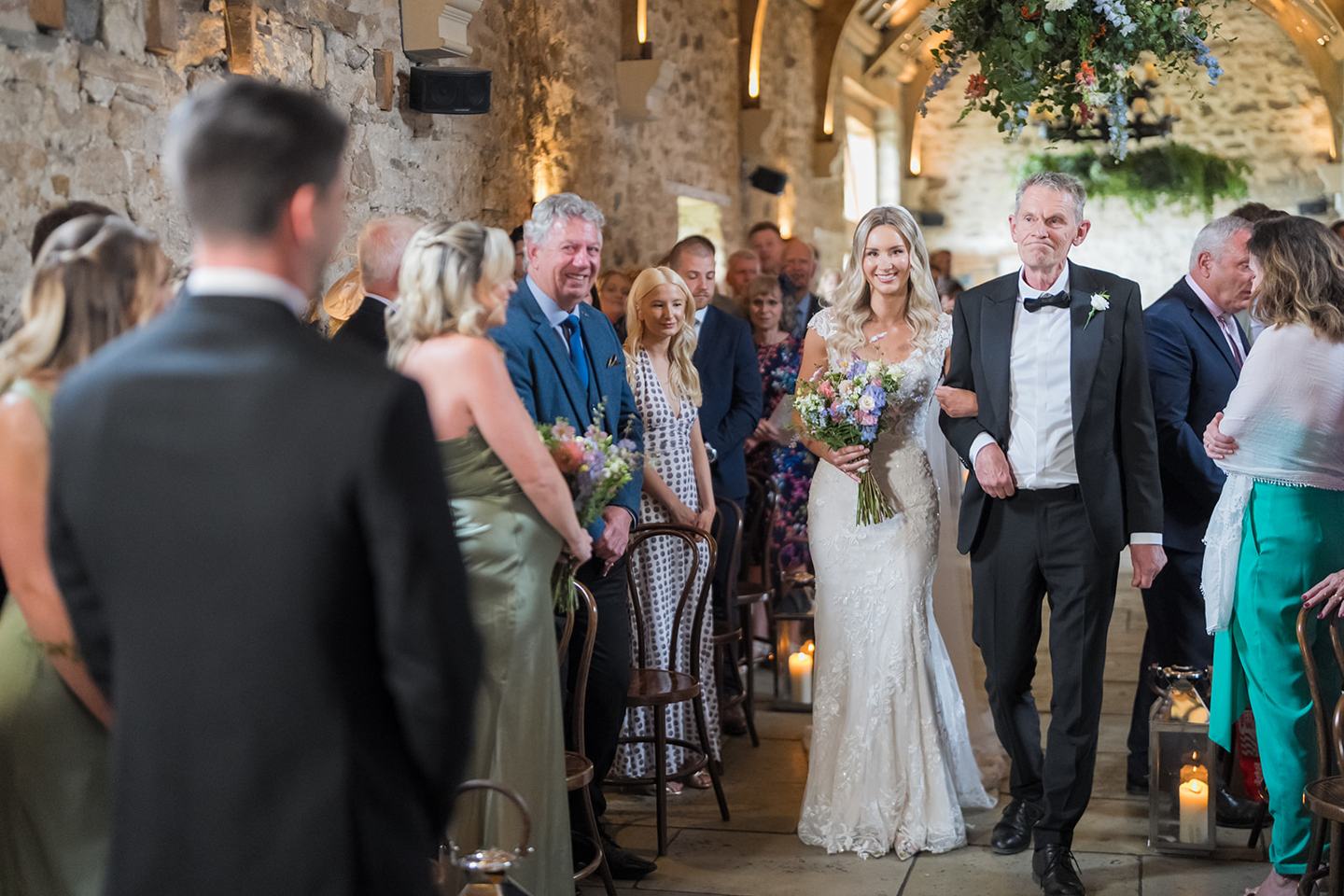 Bride arriving for the ceremony at Sophie and Sam’s Healey Barn wedding