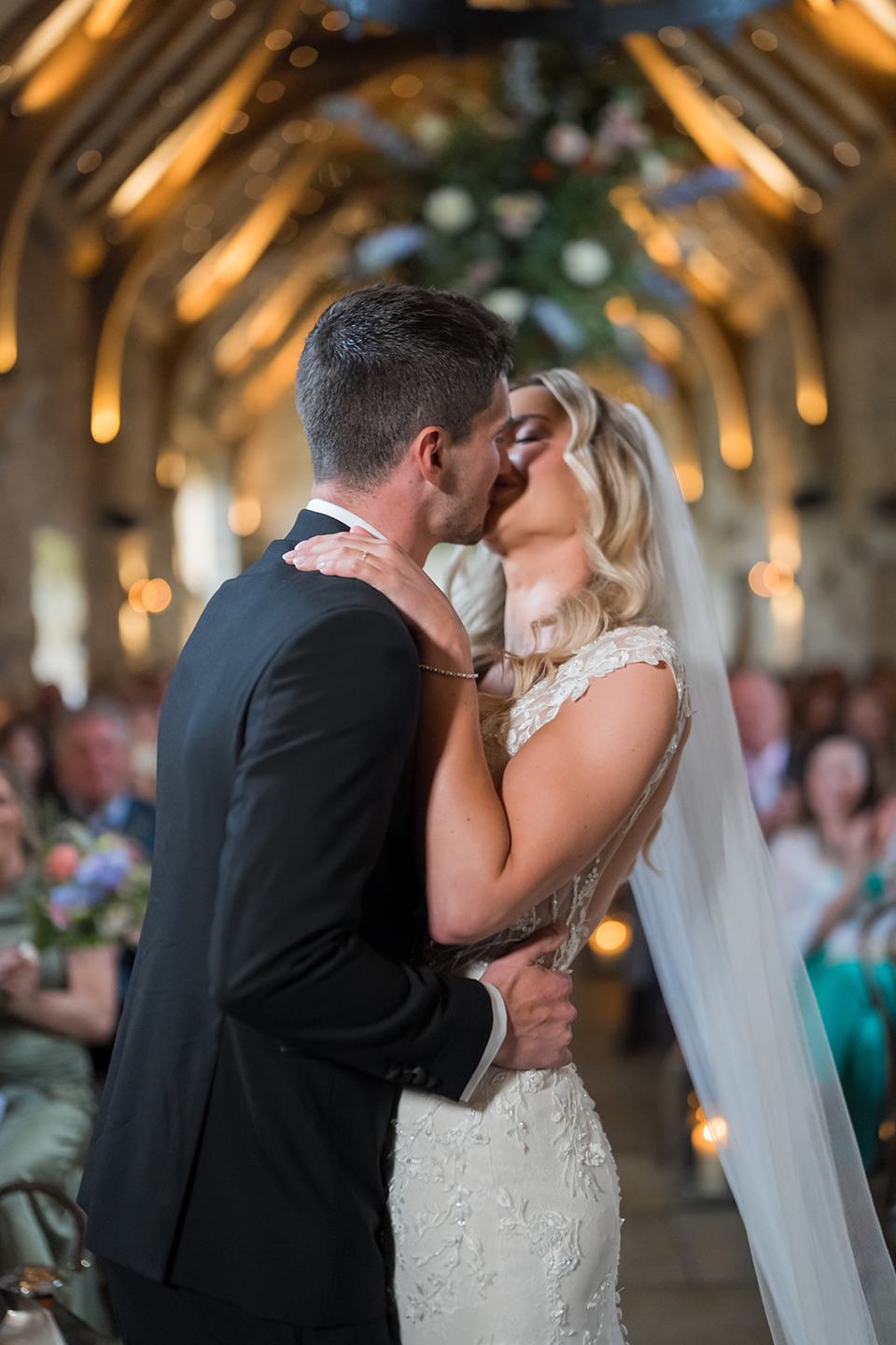 The first kiss at Sophie and Sam’s Healey Barn wedding