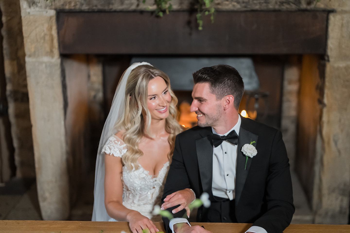 Signing the register at Sophie and Sam’s Healey Barn wedding
