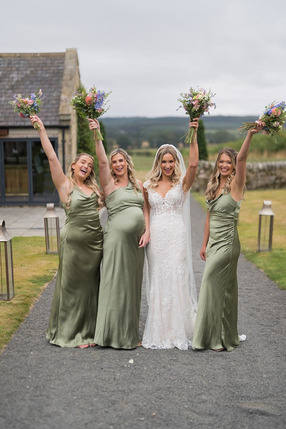 Bridesmaids celebrating at Sophie and Sam’s Healey Barn wedding