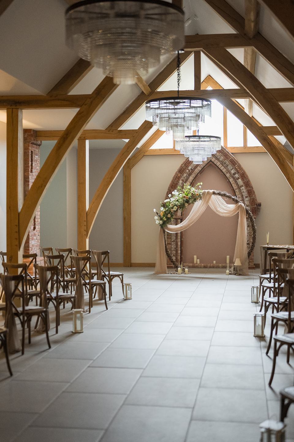 Ceremony barn decorated for the wedding at Sally and Callum’s Hornington Manor wedding