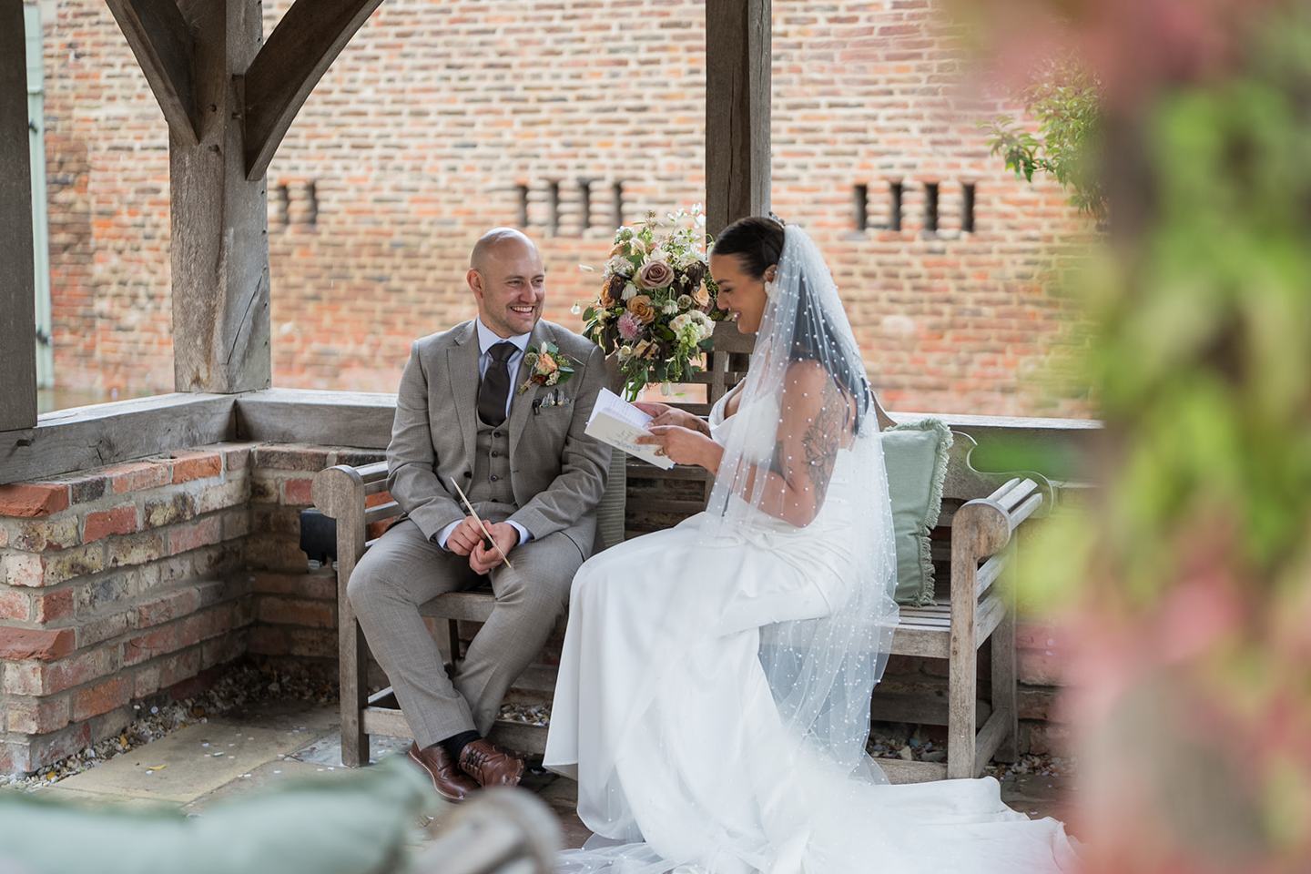 Relaxed portrait by the brick steps at Sally and Callum’s Hornington Manor wedding