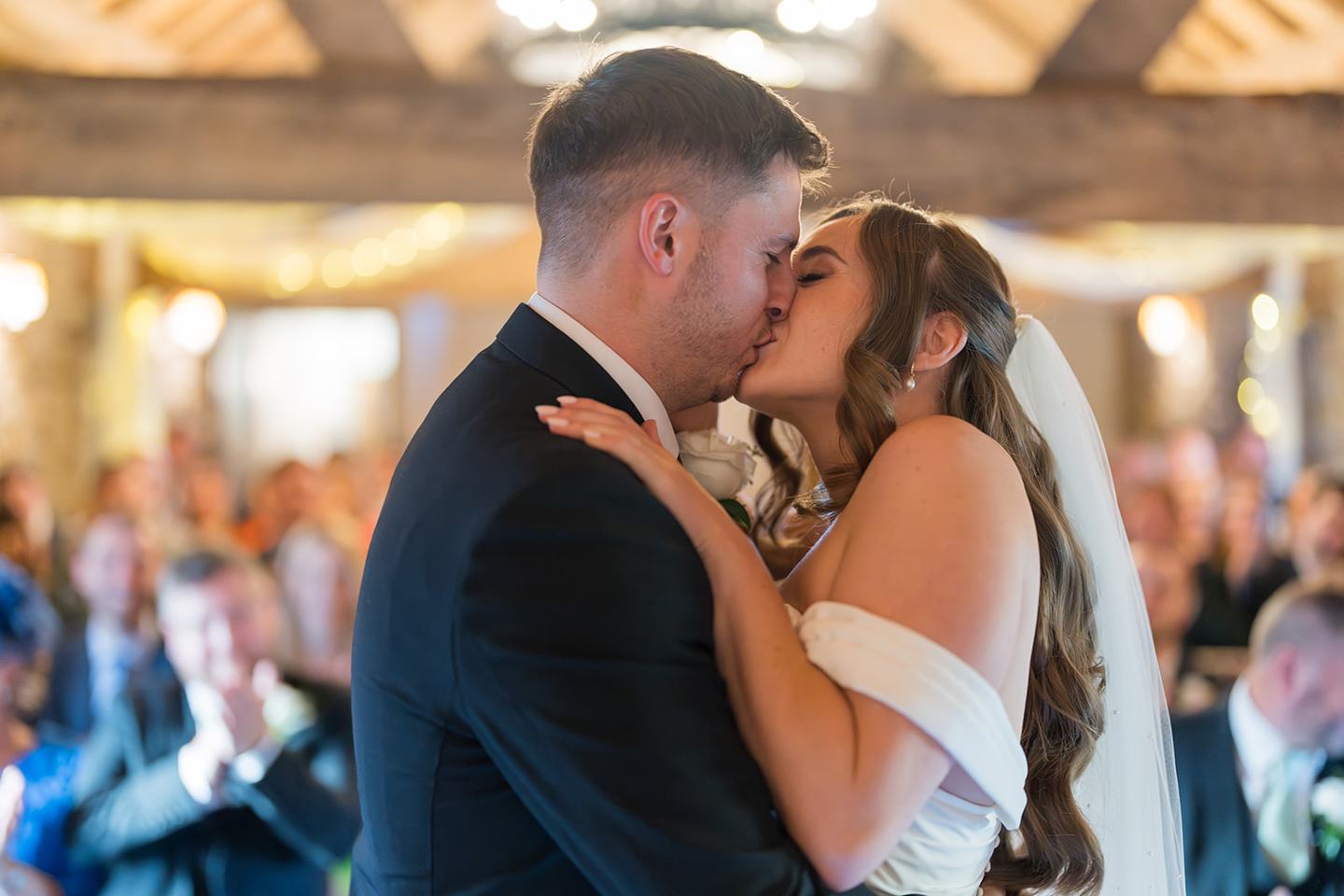 First kiss at Harriet and Gareth’s Hyde Bank Farm wedding