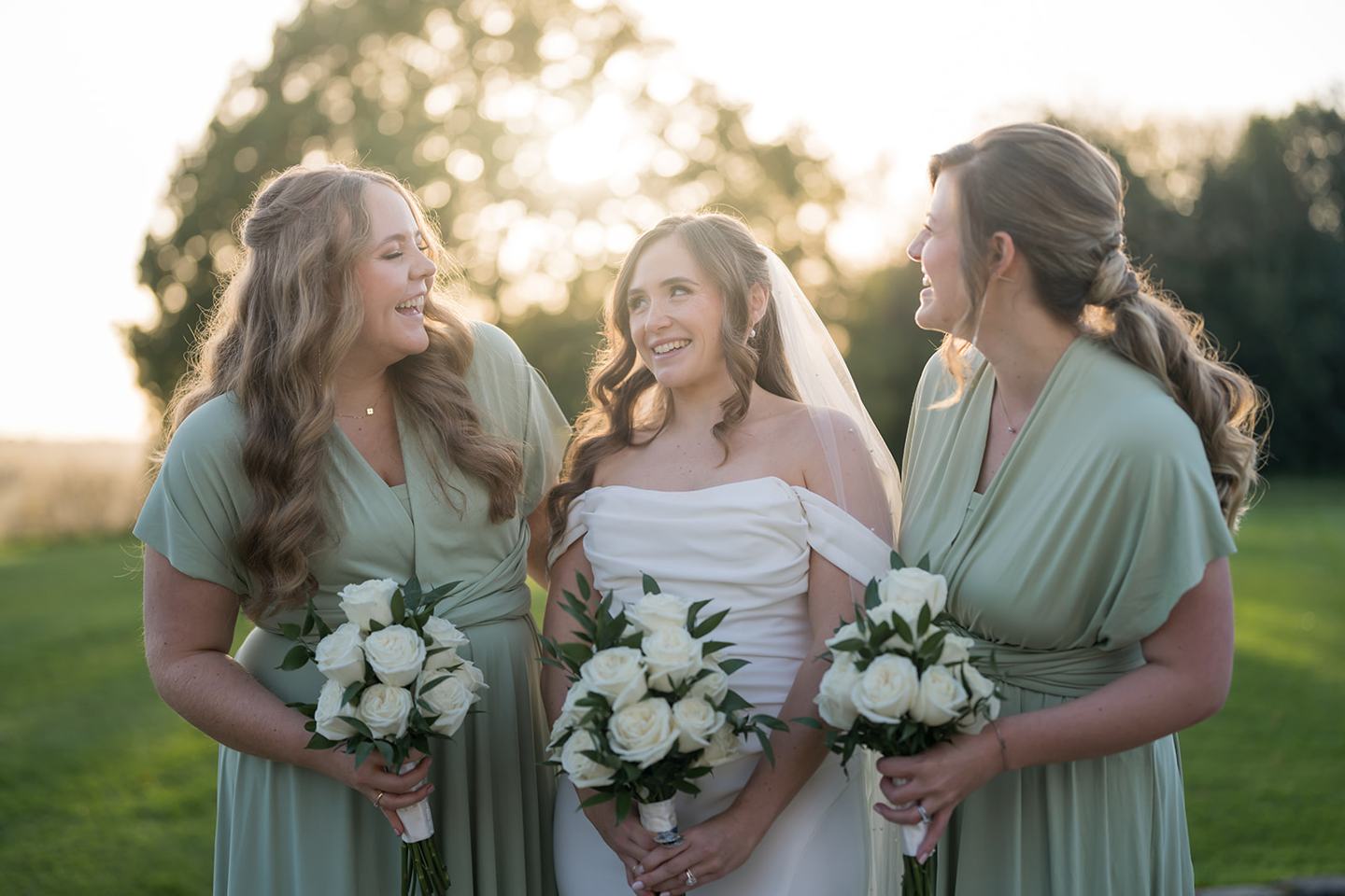 Bride with her bridesmaids at Harriet and Gareth’s Hyde Bank Farm wedding