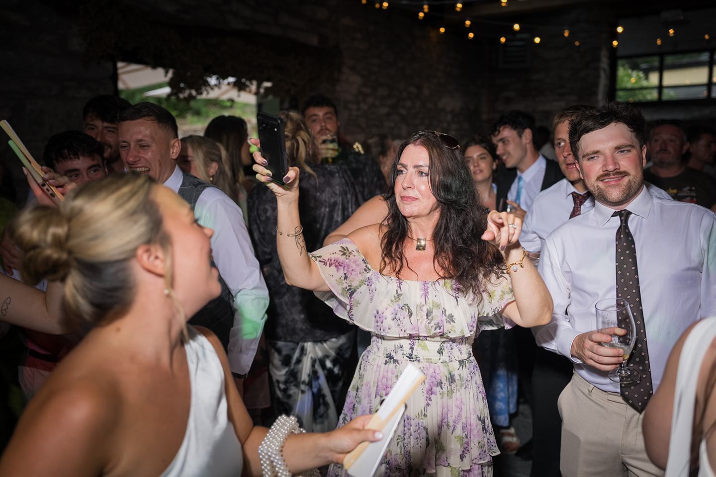 Guests enjoying the evening party at Alex and Dan’s Lancrigg wedding