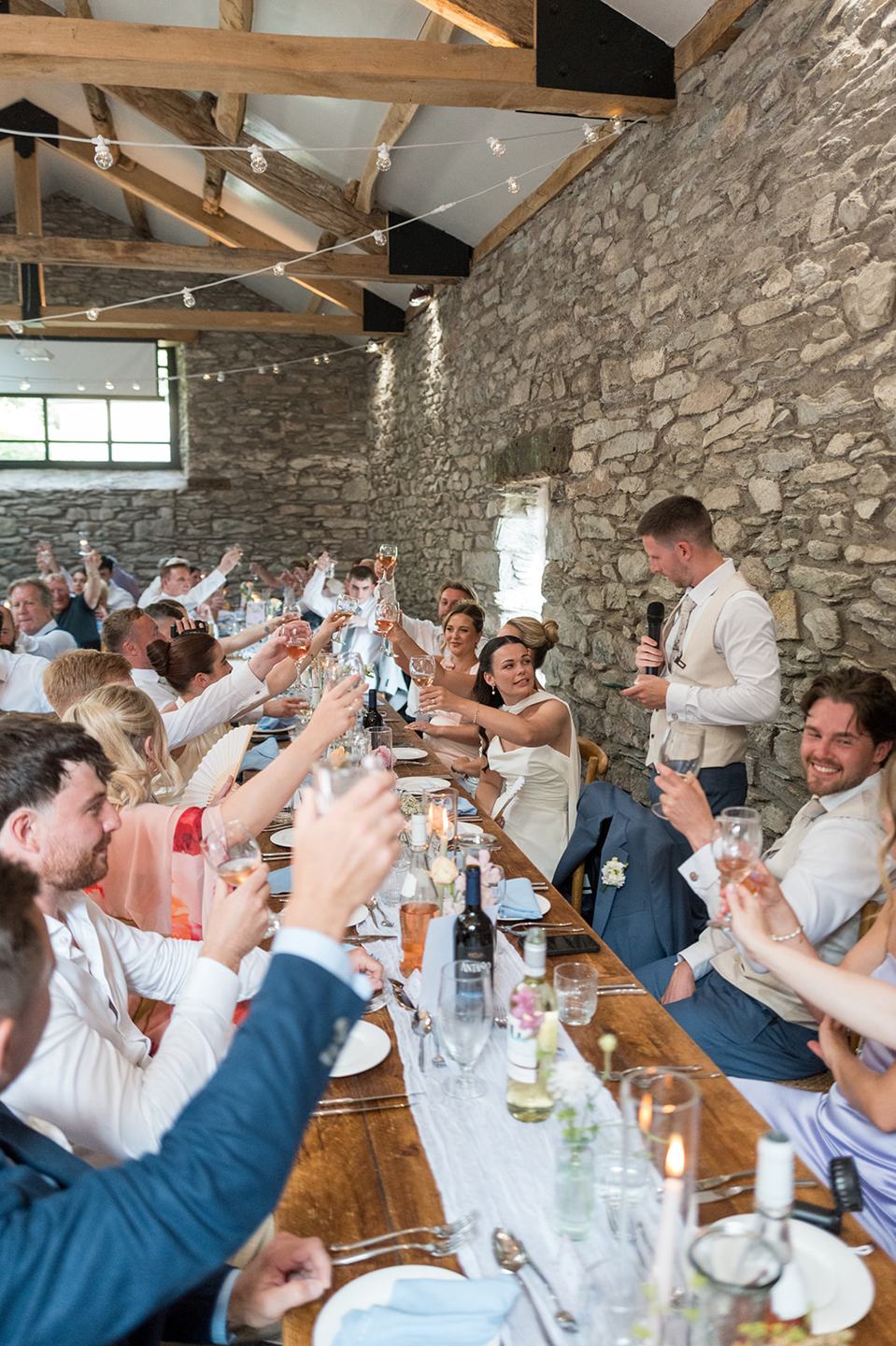 Wedding breakfast celebrations at Alex and Dan’s Lancrigg wedding