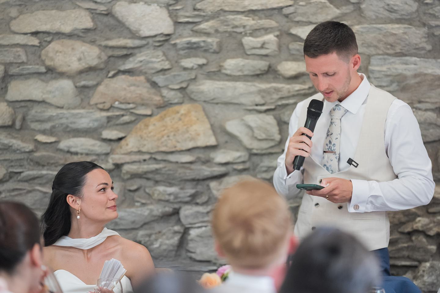 Wedding speeches in the barn at Alex and Dan’s Lancrigg wedding