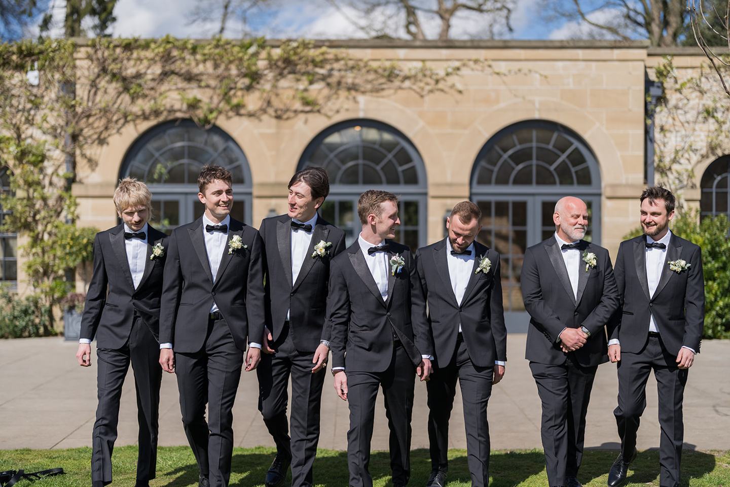 Groom with his wedding party at Becky and Alex’s Middleton Lodge wedding