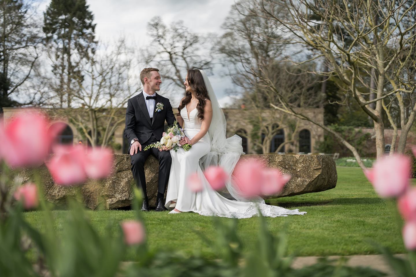 Portrait among the spring flowers at Becky and Alex’s Middleton Lodge wedding