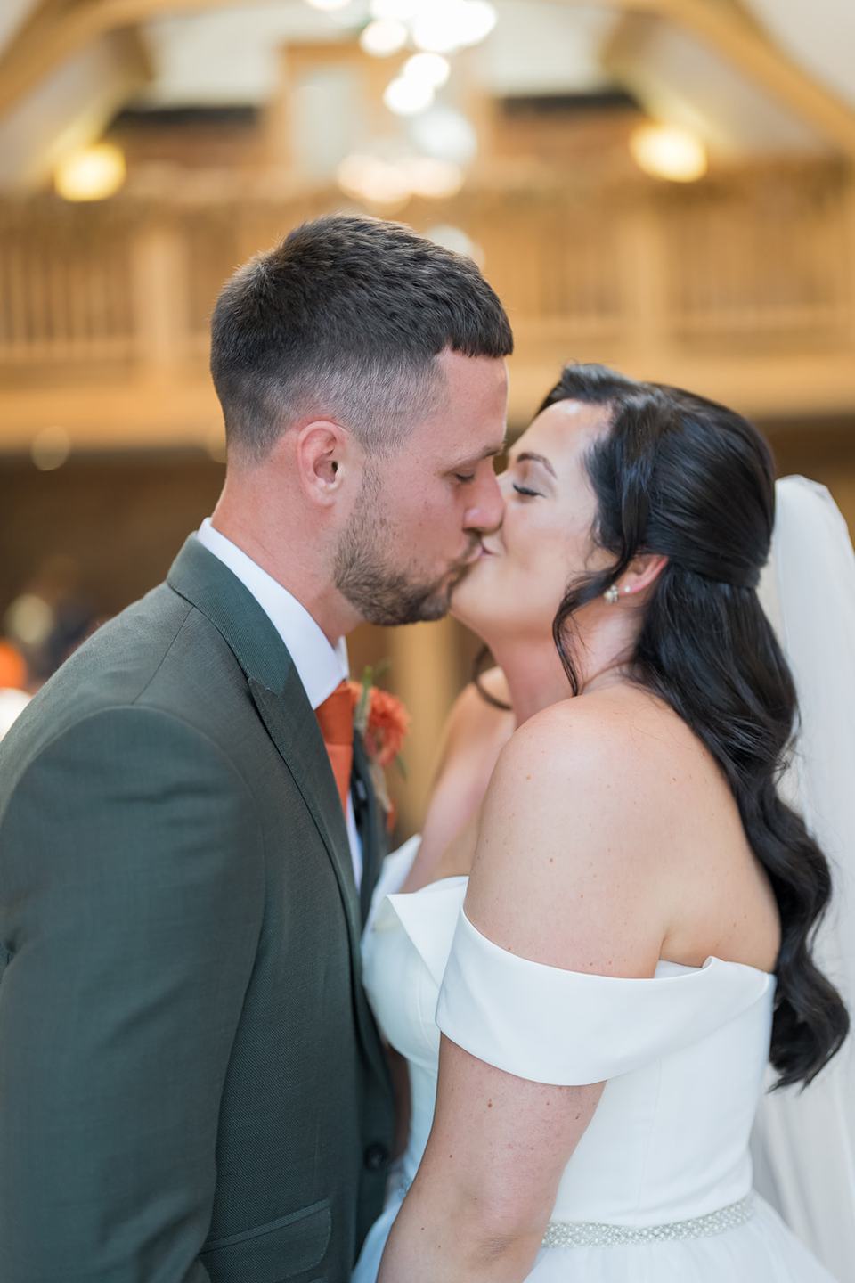 First kiss at Kate and Kieran’s Mythe Barn wedding