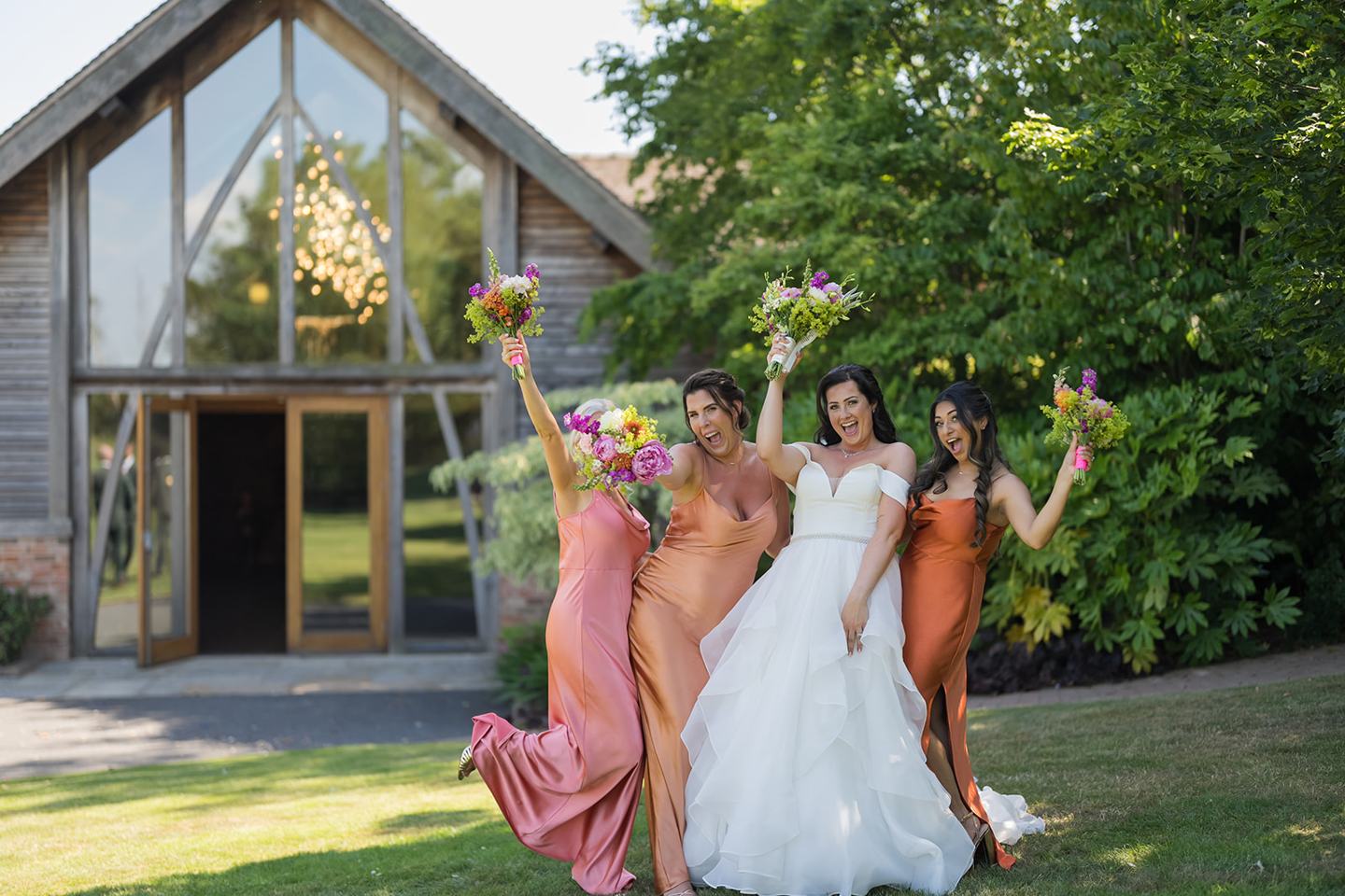 Bride with her bridesmaids at Kate and Kieran’s Mythe Barn wedding