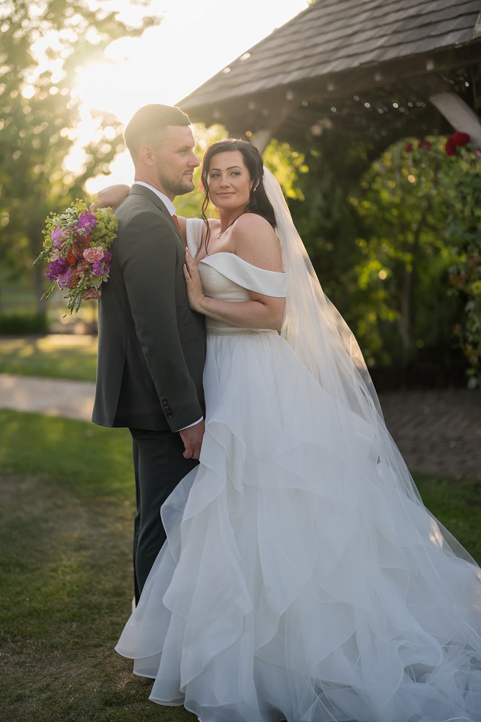 Golden hour wedding portrait at Kate and Kieran’s Mythe Barn wedding