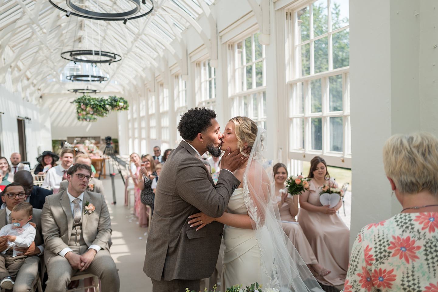 First kiss in the Orangery at Kate and Jacob’s The Orangery at Ingestre wedding