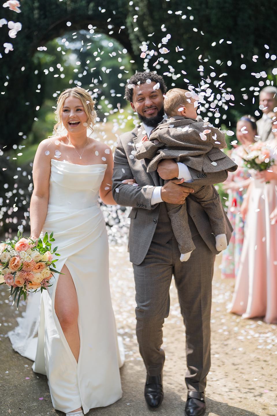 Confetti on the garden steps at Kate and Jacob’s The Orangery at Ingestre wedding