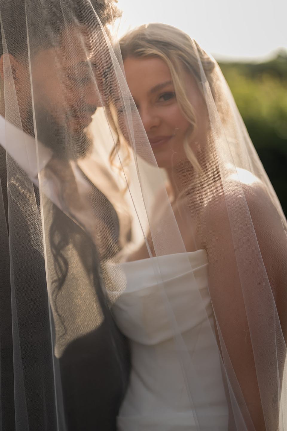 Golden hour portrait beneath the veil at Kate and Jacob’s The Orangery at Ingestre wedding
