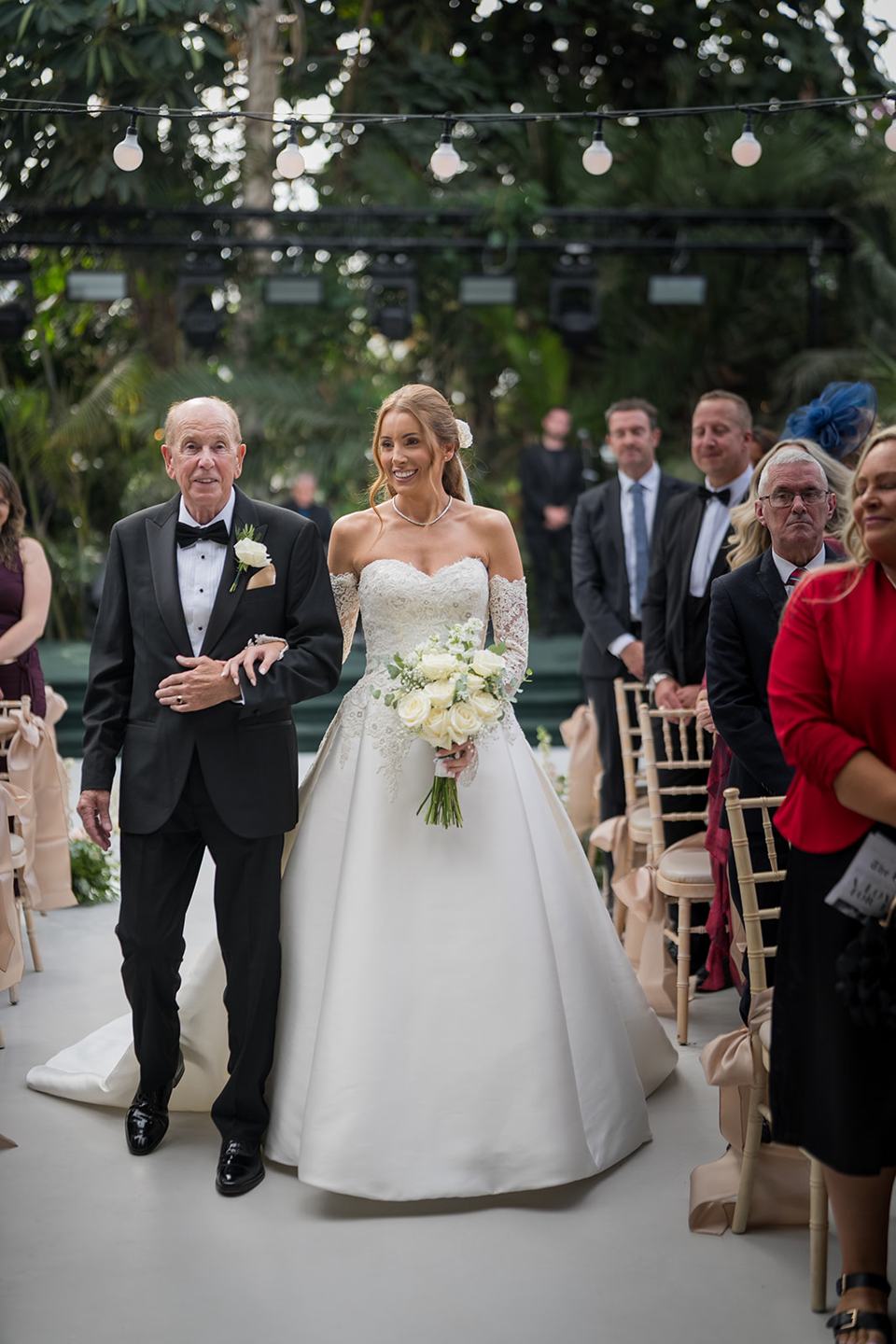 Bride arriving for the ceremony at Heather and Charlie’s Sefton Park Palm House wedding