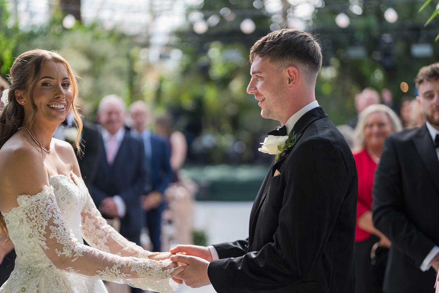 Exchanging vows at Heather and Charlie’s Sefton Park Palm House wedding