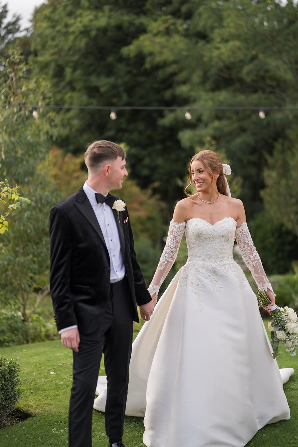 Walking through the park at Heather and Charlie’s Sefton Park Palm House wedding