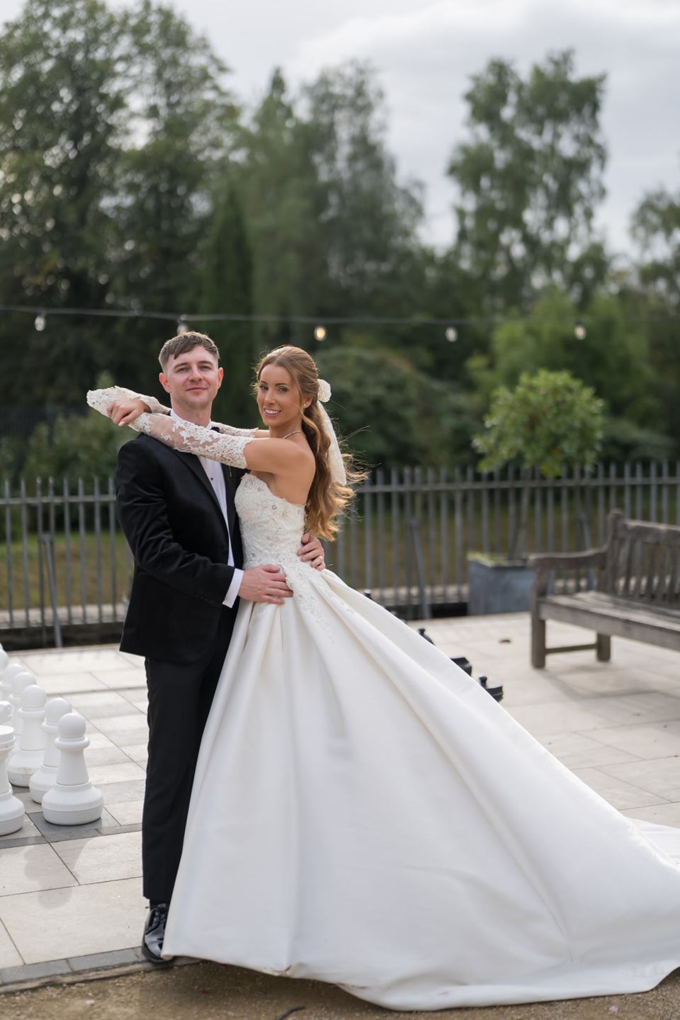 A playful portrait in the park at Heather and Charlie’s Sefton Park Palm House wedding