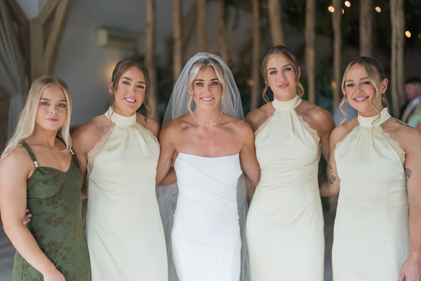 Bridesmaids together at Lauren and Ryan’s The River Barn wedding