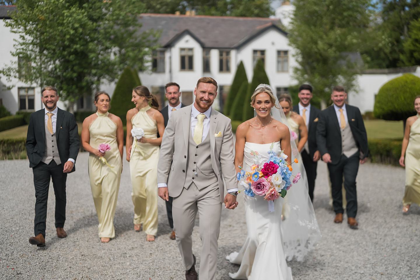 Wedding party outside the house at Lauren and Ryan’s The River Barn wedding