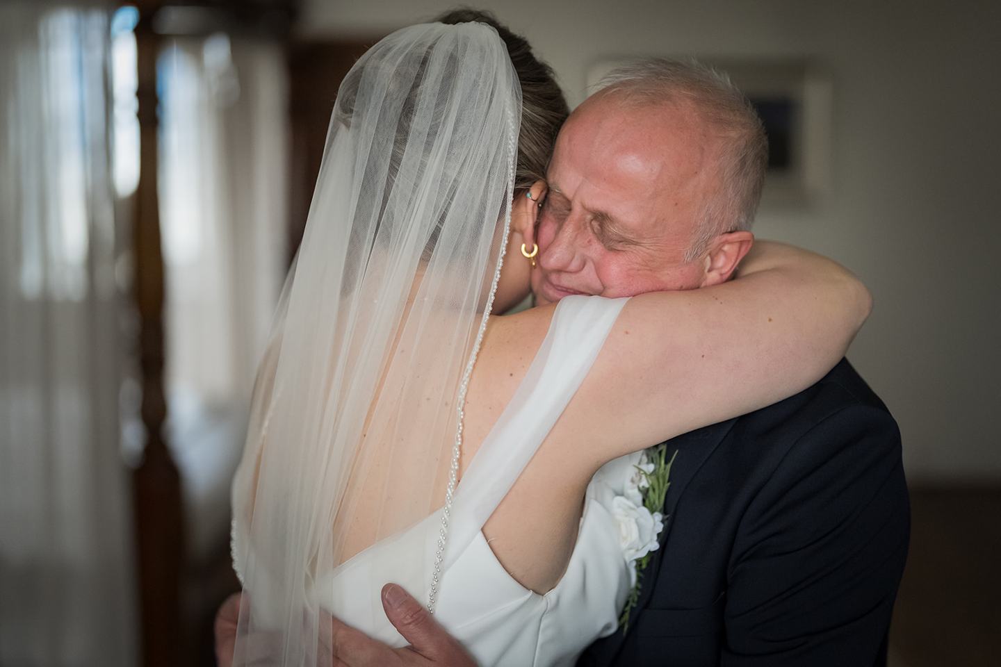 Bride greeting her father at Rachel and Sean’s West Tower wedding