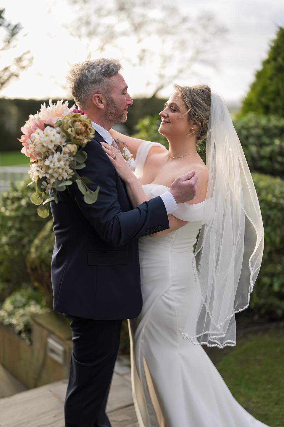 Couple portrait in the grounds at Rachel and Sean’s West Tower wedding