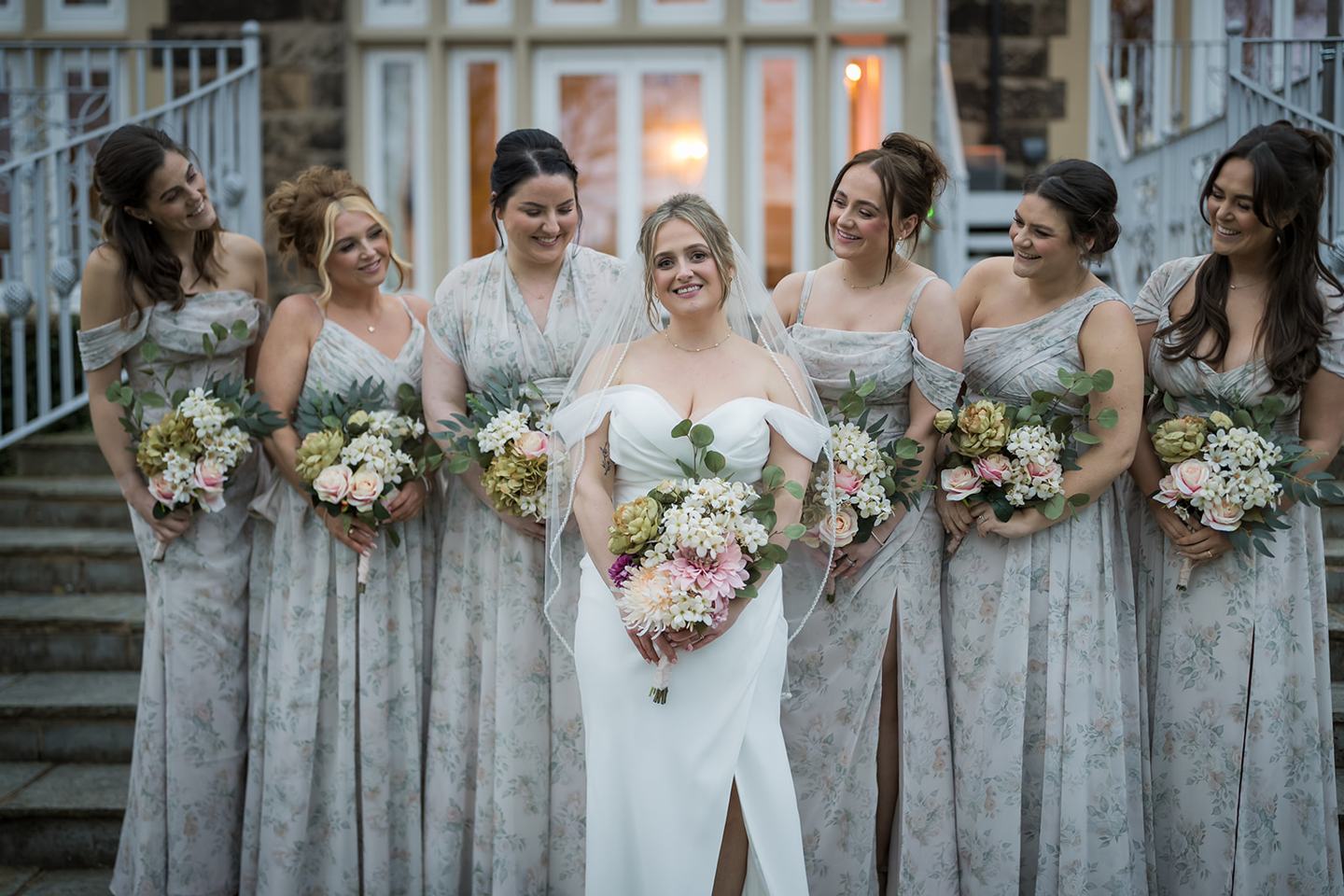 Bridesmaids on the steps at Rachel and Sean’s West Tower wedding