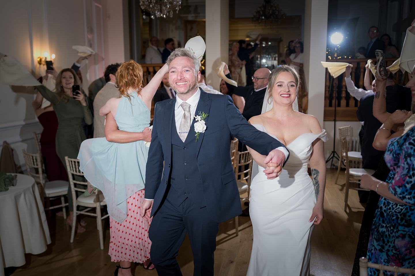 Couple entering their wedding reception at Rachel and Sean’s West Tower wedding