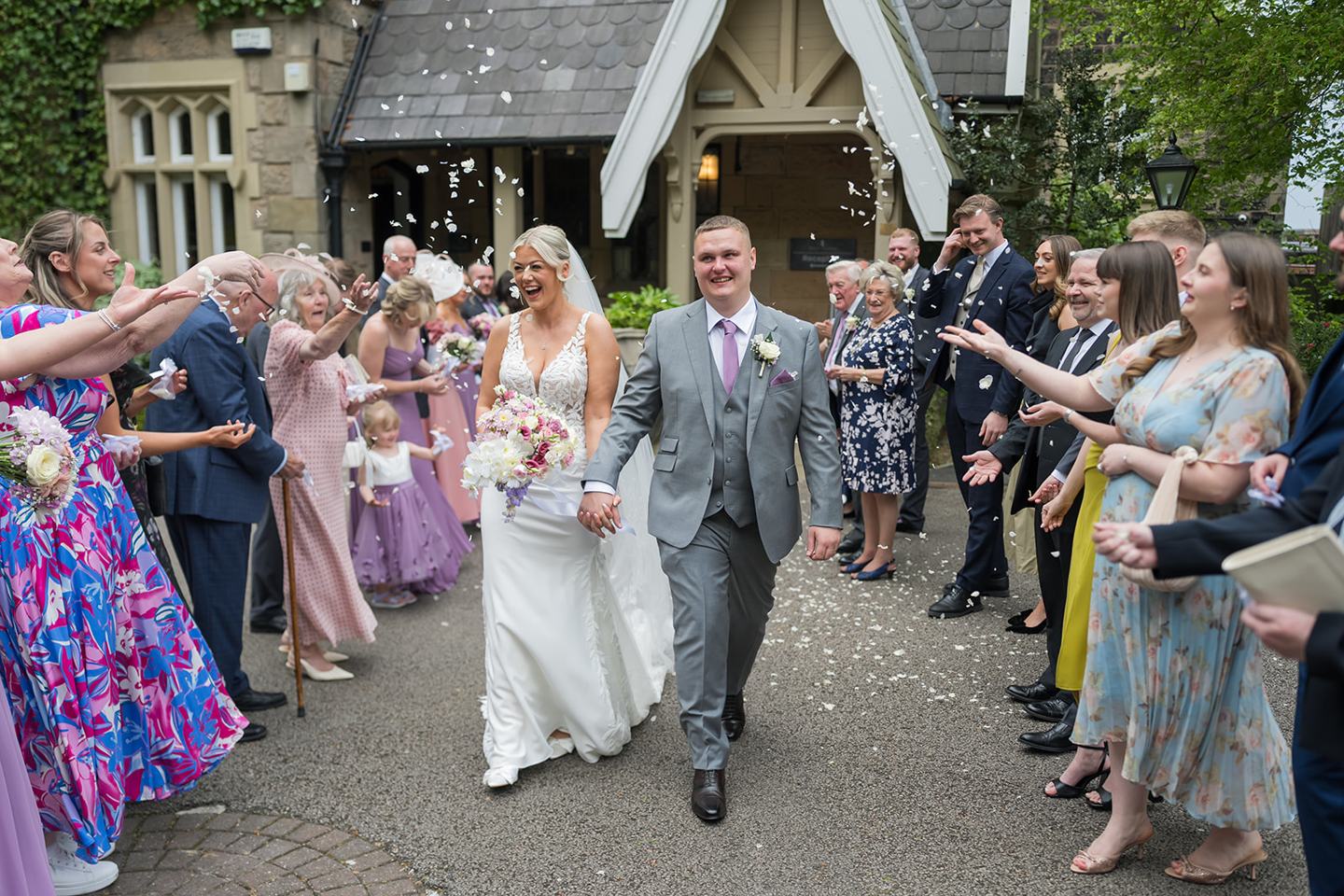 Confetti outside West Tower at Samantha and Adam’s West Tower wedding