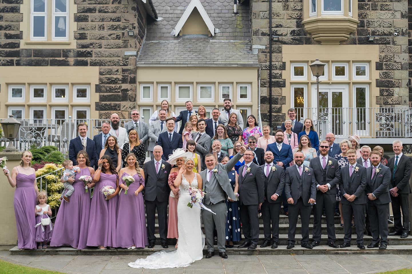 Wedding guests on the steps at Samantha and Adam’s West Tower wedding
