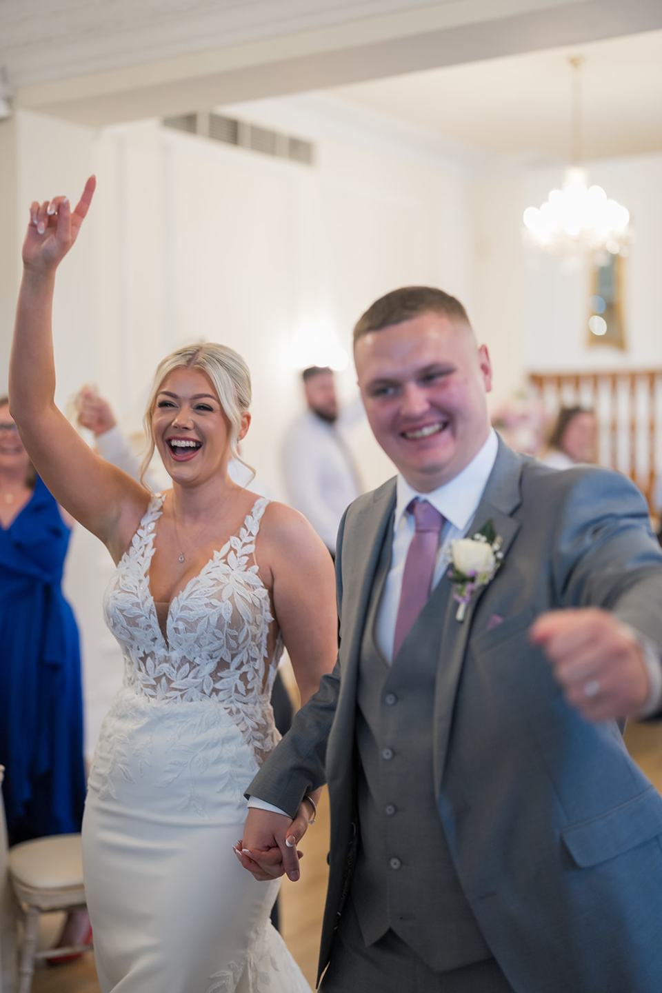Couple celebrating their reception entrance at Samantha and Adam’s West Tower wedding