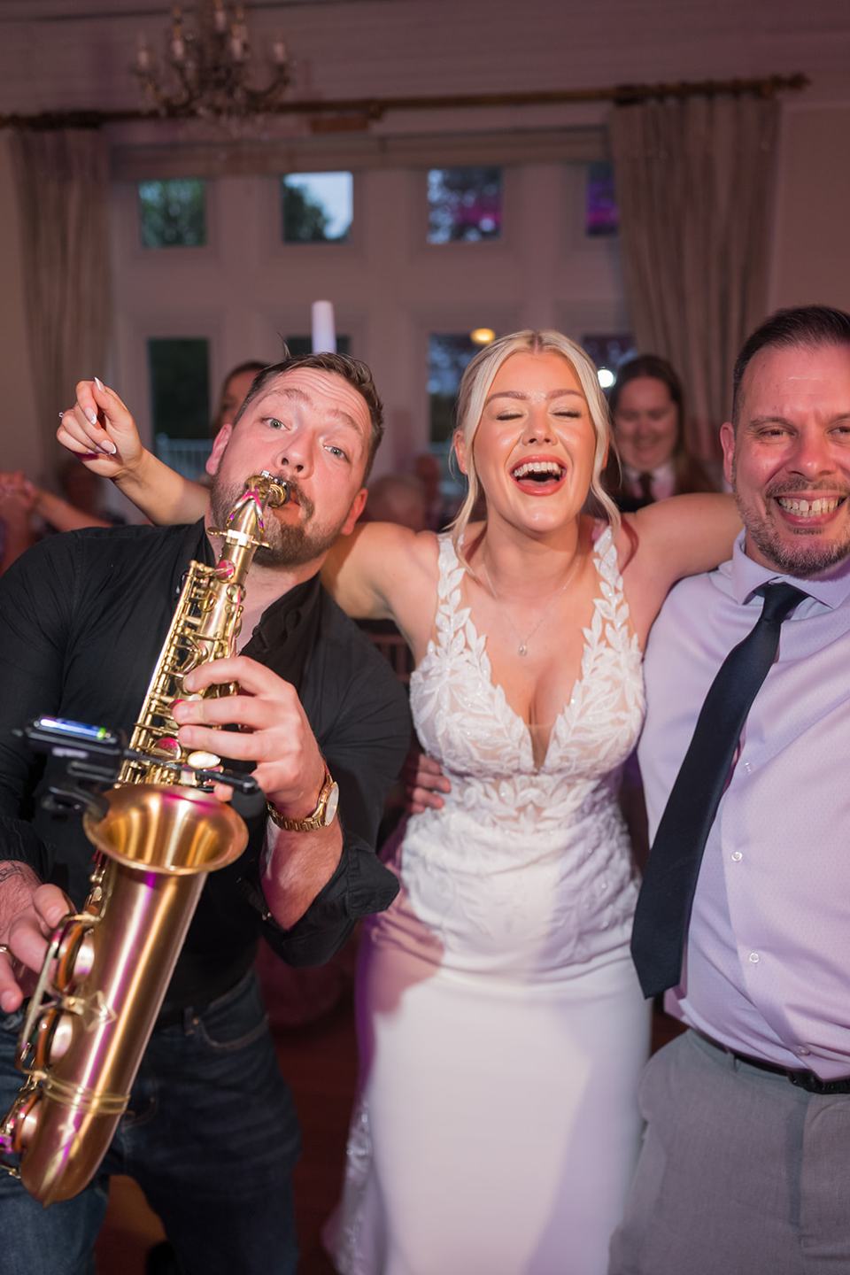 Evening saxophone and dancing at Samantha and Adam’s West Tower wedding