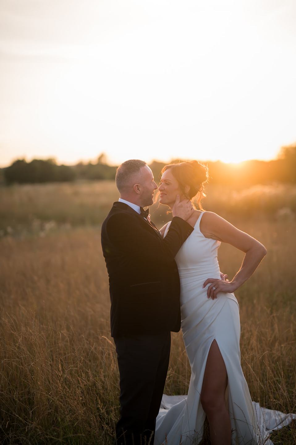 Evening portrait in the grounds at Danielle and Joe’s The Whistle Barns wedding