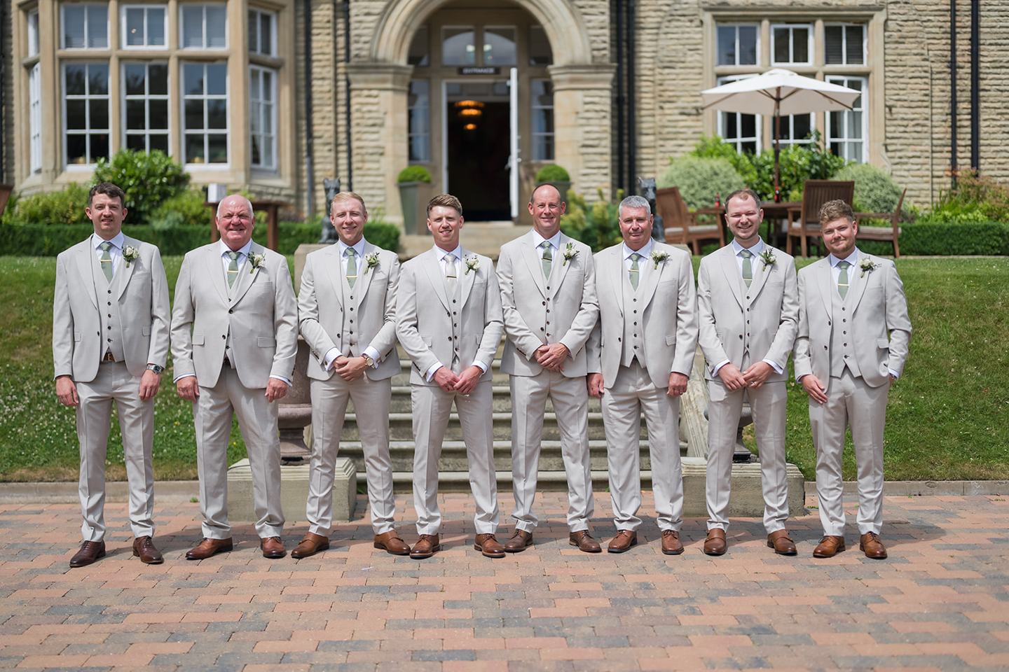 Groom and friends outside Woodlands at Chloe and James’s Woodlands Hotel wedding