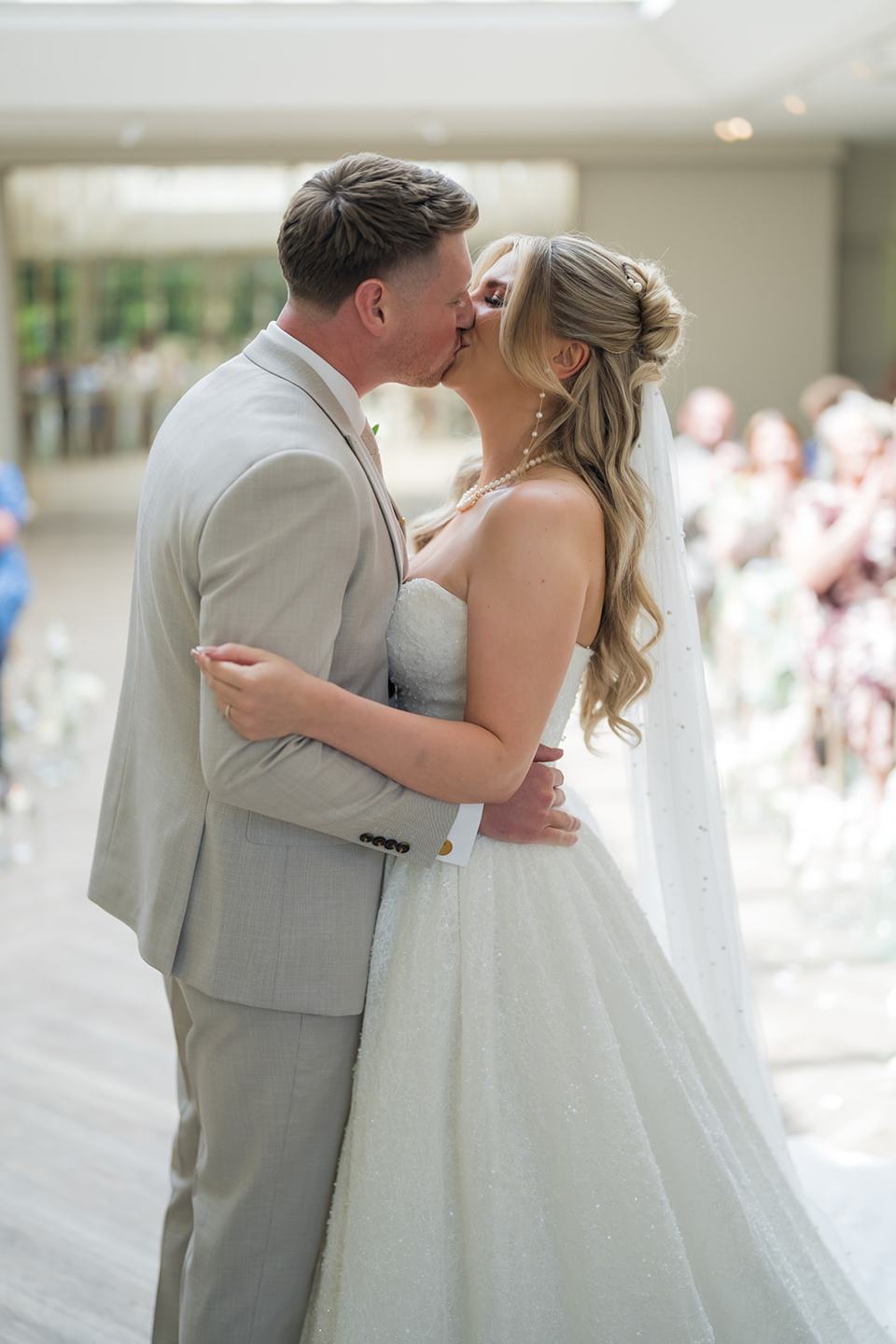 First kiss at Chloe and James’s Woodlands Hotel wedding