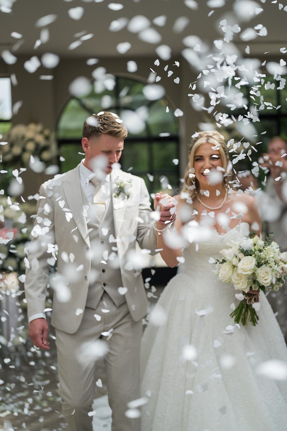 Confetti celebrations at Chloe and James’s Woodlands Hotel wedding
