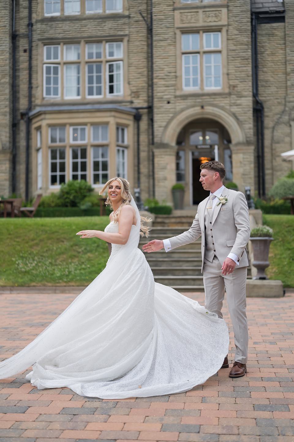 Couple dancing outside the hotel at Chloe and James’s Woodlands Hotel wedding
