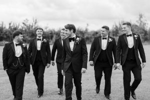 Men walking in a wedding event